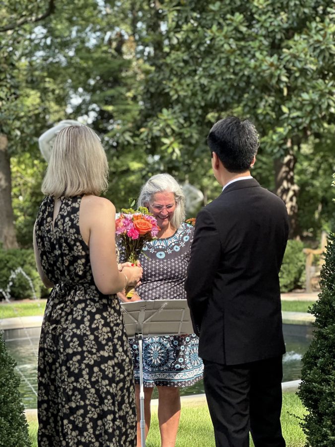 Beth officiating a wedding ceremony